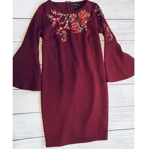 Burgundy maternity dress with floral detail